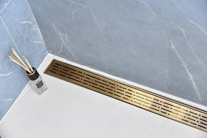 SereneDrains Satin Gold Linear Shower Drain Broken Lane Design